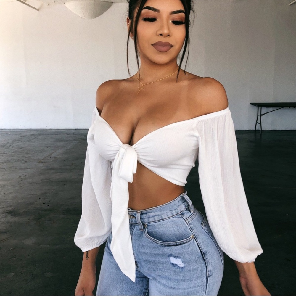 Beige colored long sleeve top